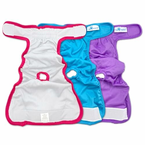 Three cloth diapers in red, blue, and purple.