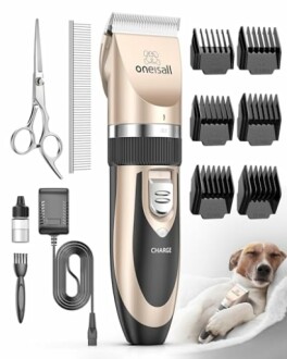 Dog grooming kit with clippers, scissors, comb, and attachments.