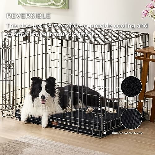 Dog lying in a metal crate with a reversible bed