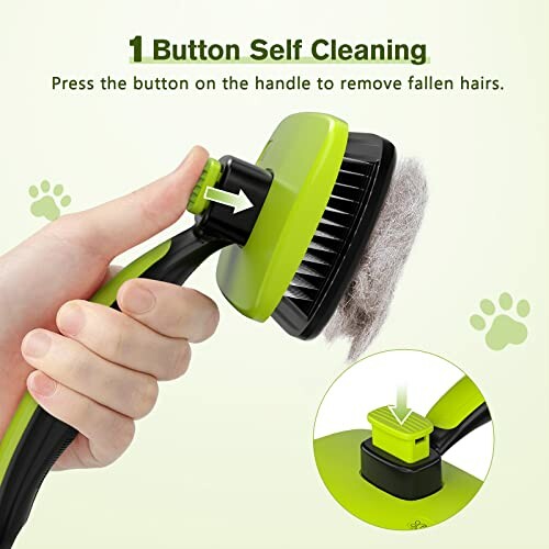 Hand holding a green pet grooming brush with self-cleaning button and fur on bristles.